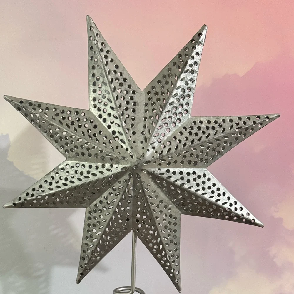 Silver Star Tree Topper Eight-point 3D star with intricate punch-work